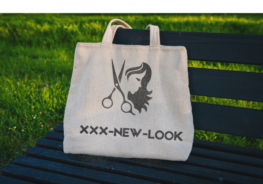 Spelled out on the tote bag: XXX-NEW-LOOK
